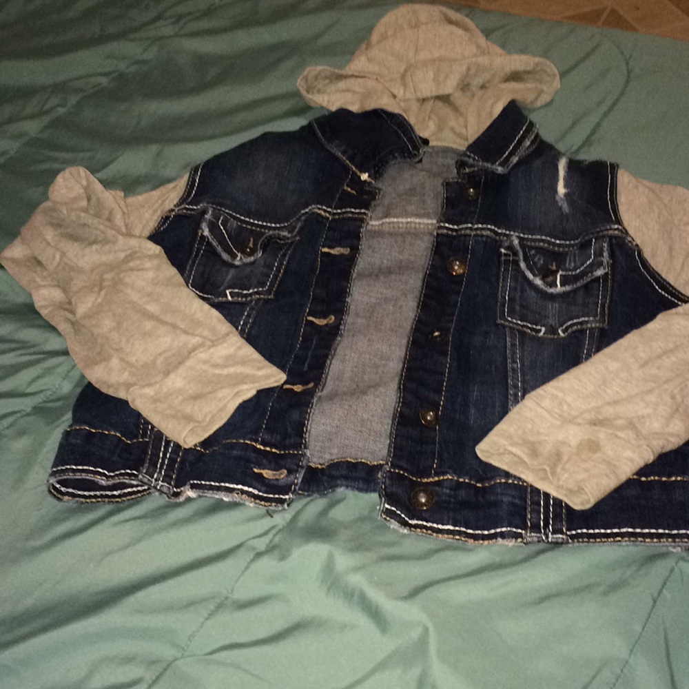 Jean jacket with grey sleeves and hoodie